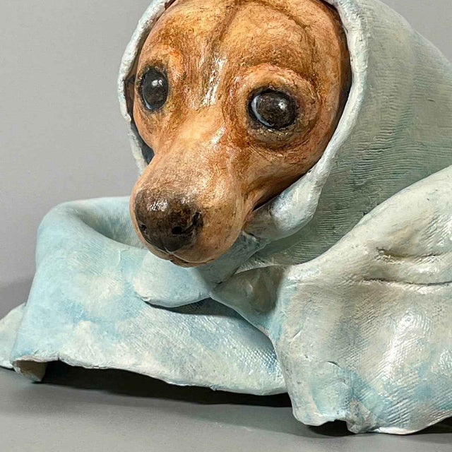Side view close-up of Polar Magician, a contemporary ceramic sculpture from the Nature Shelter Collection, highlighting the texture and profile detail.