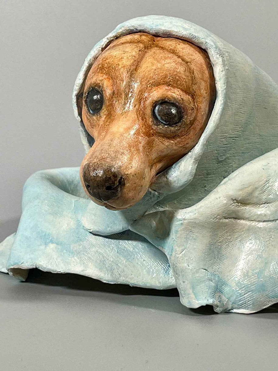 Side view close-up of Polar Magician, a contemporary ceramic sculpture from the Nature Shelter Collection, highlighting the texture and profile detail.