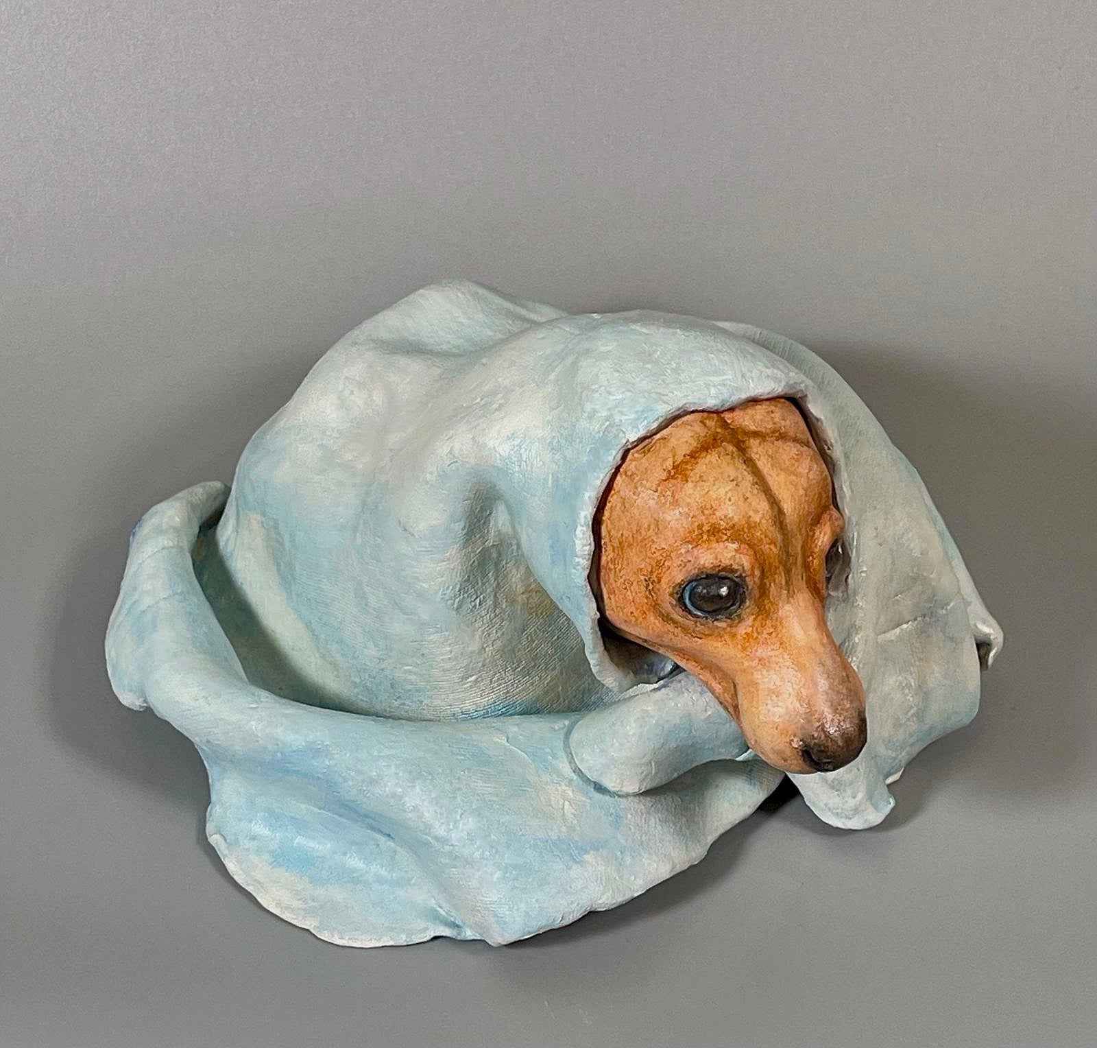 Top right angle view of Polar Magician, a contemporary ceramic sculpture from the Nature Shelter Collection, showing the upper perspective and form.