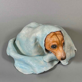 Top right angle view of Polar Magician, a contemporary ceramic sculpture from the Nature Shelter Collection, showing the upper perspective and form.